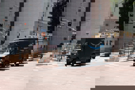 Amazon delivery truck in city