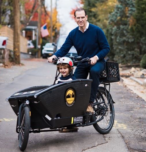 Partner Daniel Flanzig, on his Urban Arrow